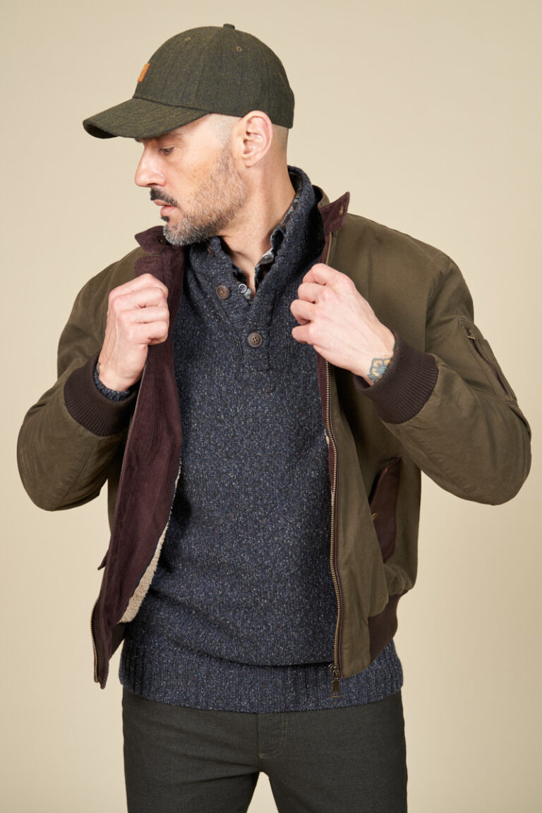 Canvas jacket and leather slanted pocket