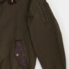 Canvas jacket and leather slanted pocket