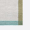 Solid scarf with tricolour woven edges