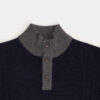 Pull col montant boutonné et torsades